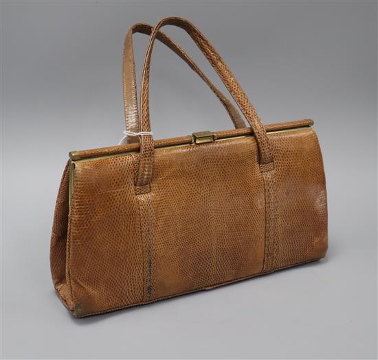 A ladys snakeskin handbag